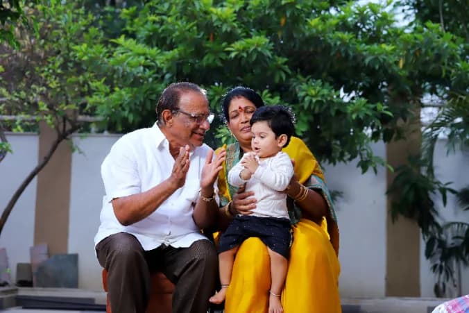Grandparents with grandchild